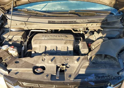 2014 Honda Odyssey Lx z USA, uszkodzony, nr VIN 5FNRL5H26EB047155